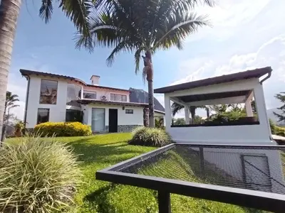 a view of the house from the backyard at Increíble villa de lujo, vistas espectaculares in Guatapé