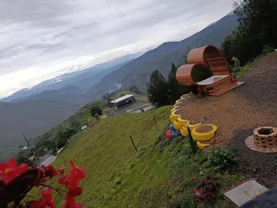 a group of pots on the side of a hill at Glamping arcoiris r in Ciudad Bolívar