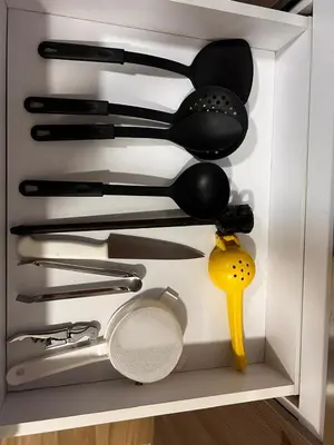 a drawer filled with lots of kitchen utensils at Bombona Apartment in Medellín