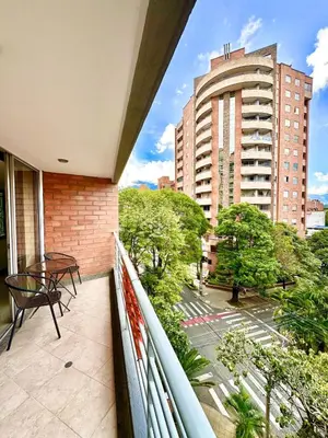 a balcony with a view of a city at Beautiful Laureles apartment in Medellín