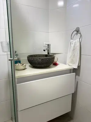 a bathroom with a sink on a counter at Apartamento cálido in Medellín