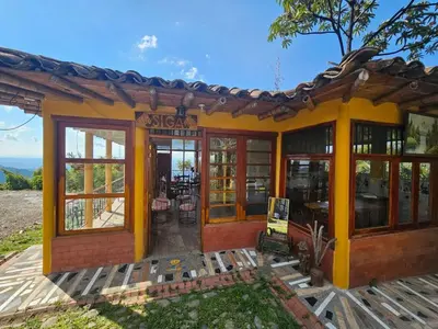 a tiny house with a view of the ocean at Perla del Ruiz in Manizales