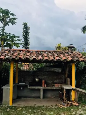 a pavilion with a roof on top of it at Perla del Ruiz in Manizales