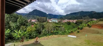 a view of a city with mountains in the background at habitación campestre para pareja JAZMIN in Jardin