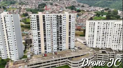 an aerial view of a city with tall buildings at Apartamentos Nuevos 2 y 3 habitaciones 6 personas - Cerca a Expoferias y Bosque Popular, Cable Aereo in Manizales