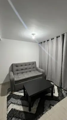 a living room with a couch and a coffee table at Apartamentos Nuevos 2 y 3 habitaciones 6 personas - Cerca a Expoferias y Bosque Popular, Cable Aereo in Manizales