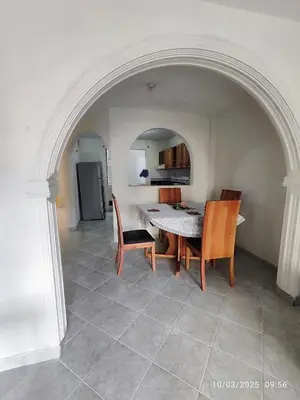a kitchen and dining room with a table and chairs at Comoda Casa en Itagüí, cerca de Medellín! Ideal para Familias y Grupos in Itagüí