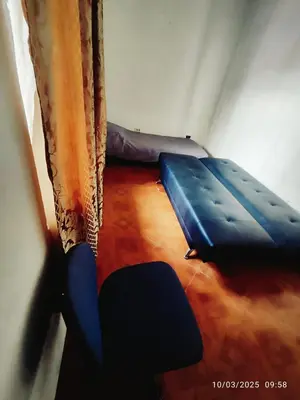 a room with two beds in a room at Comoda Casa en Itagüí, cerca de Medellín! Ideal para Familias y Grupos in Itagüí