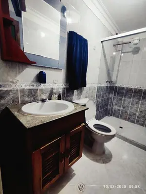 a bathroom with a sink and a toilet and a shower at Comoda Casa en Itagüí, cerca de Medellín! Ideal para Familias y Grupos in Itagüí