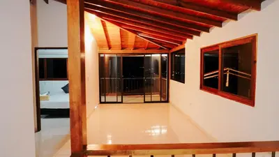 a view from the living room of a house at Oru Forest Retreat & Eco Lodge, just 15 minutes from the airport in Envigado