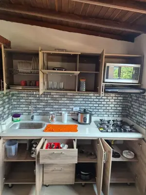 a kitchen with a sink and a counter top at Apartamento Super Lindo in Medellín