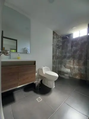 a bathroom with a toilet and a sink and a shower at Finca Villa Andrea 1h20min desde Medellín Niquía in Santa Rosa de Osos