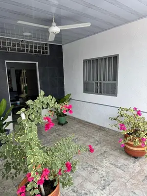 a room with potted plants and a ceiling at Hotel Regional in La Dorada