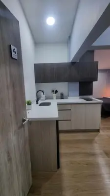 a kitchen with a sink and a counter top at Casa 1982 in Manizales