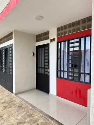 a pair of doors on a building at Estrena confortable casa in Mariquita