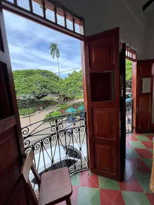 an open door to a balcony with a view at Famihotel Asturias in Hispania