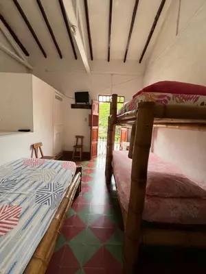 a bedroom with two bunk beds in a room at Famihotel Asturias in Hispania