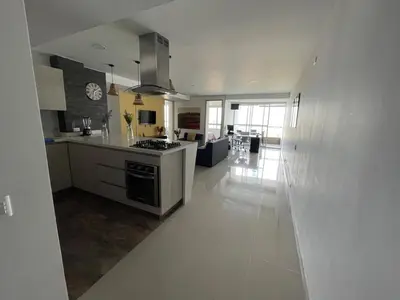 a large white kitchen with a stove top oven at Superior apto vista campestre in Sabaneta