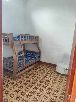a room with two bunk beds and a toilet at Encanto colonial in Sopetran