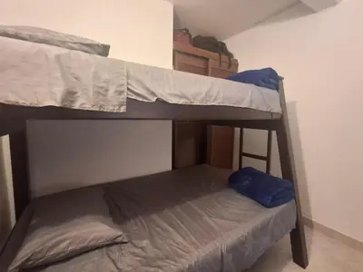 a couple of bunk beds in a room at Hostal Naty luna - sede alterna in Jardin