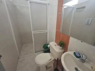 a bathroom with a toilet and a shower and a sink at Hostal Naty luna - sede alterna in Jardin