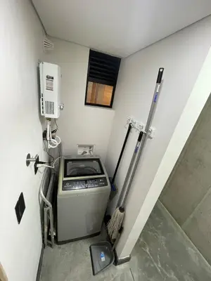 a room with a fax machine in a room at Medellín Apartment Loft in Medellín