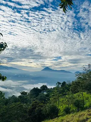 a view of a mountain in the sky with clouds at Titiribi-Antioquia- Cabaña el sol in Titiribí