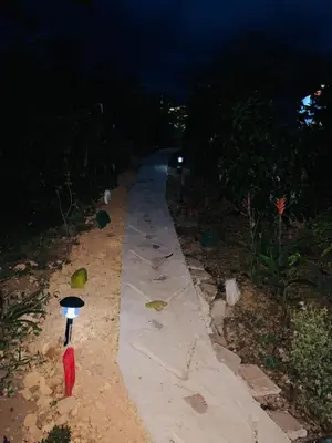a walking path at night with a light on it at Titiribi-Antioquia- Cabaña el sol in Titiribí