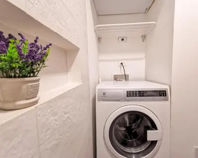 a laundry room with a washer and dryer at Amazing view - Poblado in Medellín