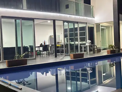 an office building with a pool in the middle of it at XDfinca in Palermo