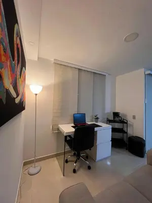 an office with a desk with a laptop on it at Casa Eternal Comfort and Style in Envigado