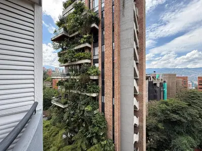 a building with plants on the side of it at Ac, fast wifi 400 mg, quiet, nature in El Poblado in Medellín
