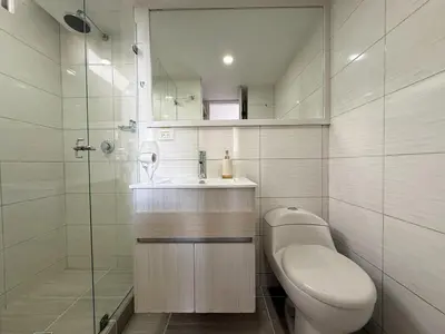 a bathroom with a toilet and a sink and a shower at Ac, fast wifi 400 mg, quiet, nature in El Poblado in Medellín