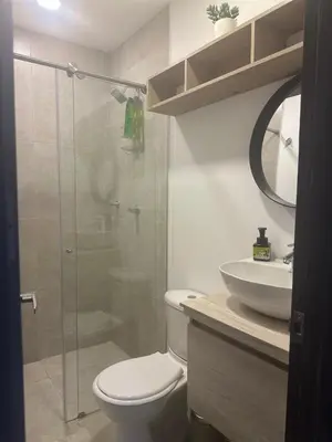 a bathroom with a shower and a toilet and a sink at Beautiful Santa Fe de Antioquia DiSole apartment in Santa Fe de Antioquia