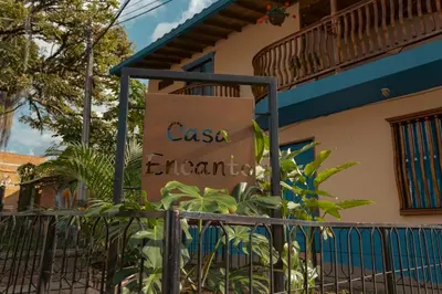 a sign for the casa esmeralda in front of a building at Hotel Casa Encanto Jardín in Jardin