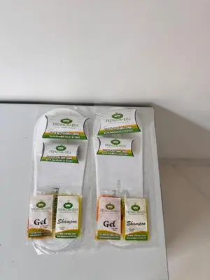 three packages of cheese on a shelf in a refrigerator at Hotel Premium BISS in Supía