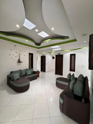 a living room with couches and chairs in a room at Hotel Premium BISS in Supía