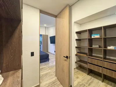 a room with a door leading to a bedroom at 3BR Esmeralda Country Home Santa Elena in Santa Elena