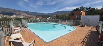 a swimming pool on top of a building at Espacio en Medellin, Ideal para tu estilo de vida moderno, estrátegico y cómodo in Medellín