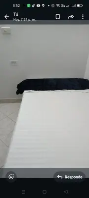 a close up of a bed in a room at En el mejor punto de Medellin in Medellín