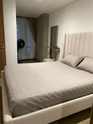 a bedroom with a large white bed in a room at El Poblado, Medellin, Antioquia, Colombia in Medellín