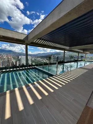 a swimming pool on the roof of a building at El Poblado, Medellin, Antioquia, Colombia in Medellín
