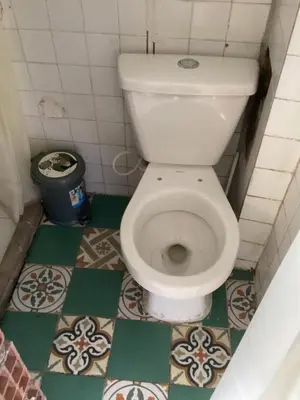 a bathroom with a white toilet in a room at Hostal Las Hamacas,Habitación #5 in Villamaría