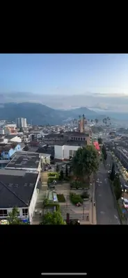 a view of a city with buildings and a street at Mirador del Ruiz Aparta Estudio in Manizales