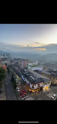 an overhead view of a city with a street at Mirador del Ruiz Aparta Estudio in Manizales
