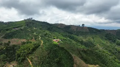 an aerial view of a mountain with a house on it at Mirador La Fortuna in San JosÃ©