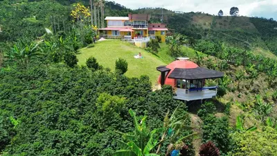 an aerial view of a house on a hill at Mirador La Fortuna in San JosÃ©