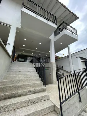 a set of stairs leading to a building at Casa Hotel Spa Carolina in Carolina del Principe