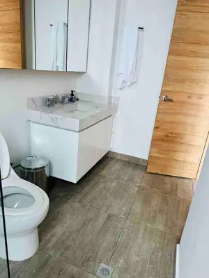 a bathroom with a white toilet and a sink at Country house near the airport and Medellin in El Retiro