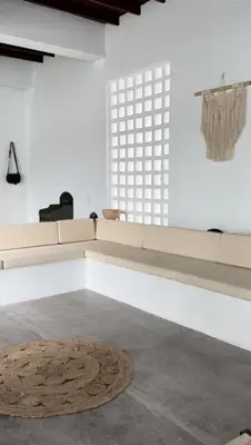 a white room with a couch and a rug at Casa La Oronda - Hotel Boutique- Cauca Viejo in Jericó